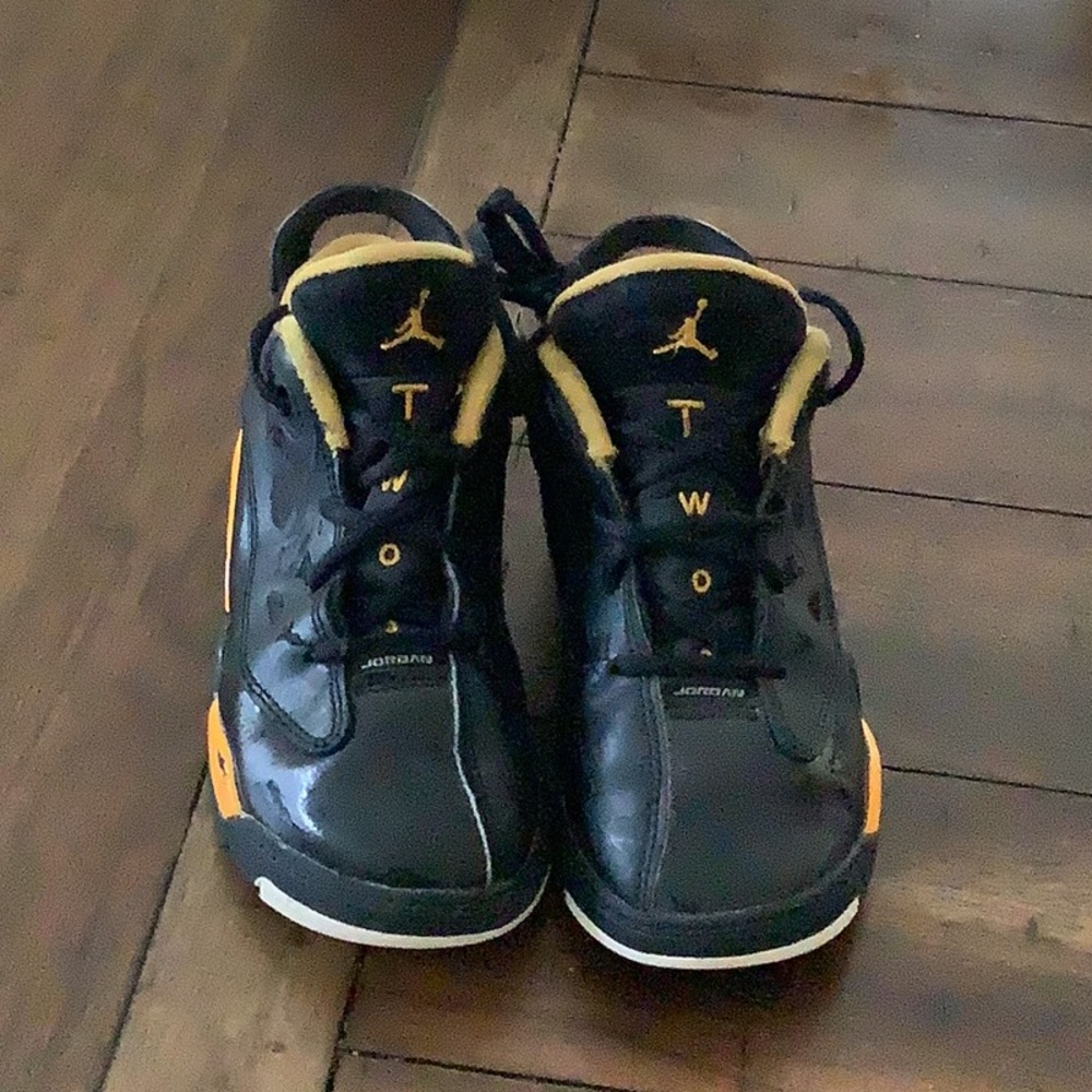 Jordan Black and Yellow Sneakers with Classic Basketball Silhouette